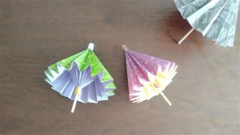 小雨傘怎么折,能打開(kāi)的小雨傘怎么折縮略圖